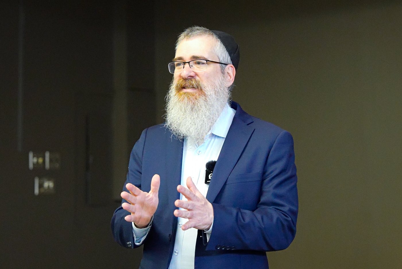 Avrohom Jacks delivering a keynote