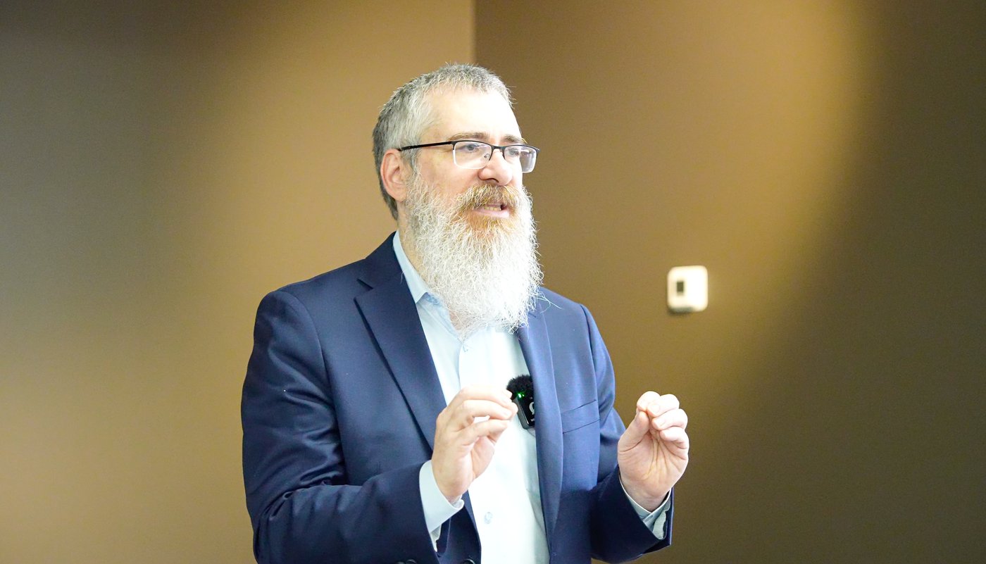 Avrohom Jacks speaking to an audience